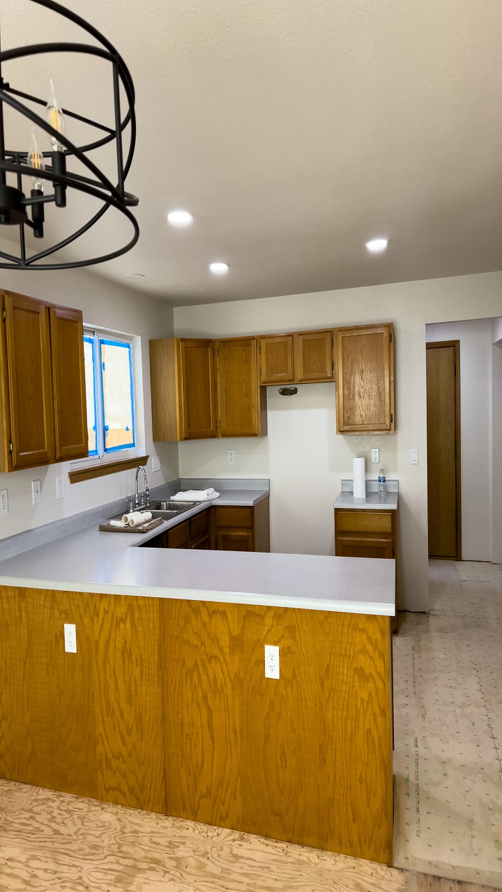 kitchen undergoing renovation, featuring wooden cabinets Take Photos Before You Undo Anything