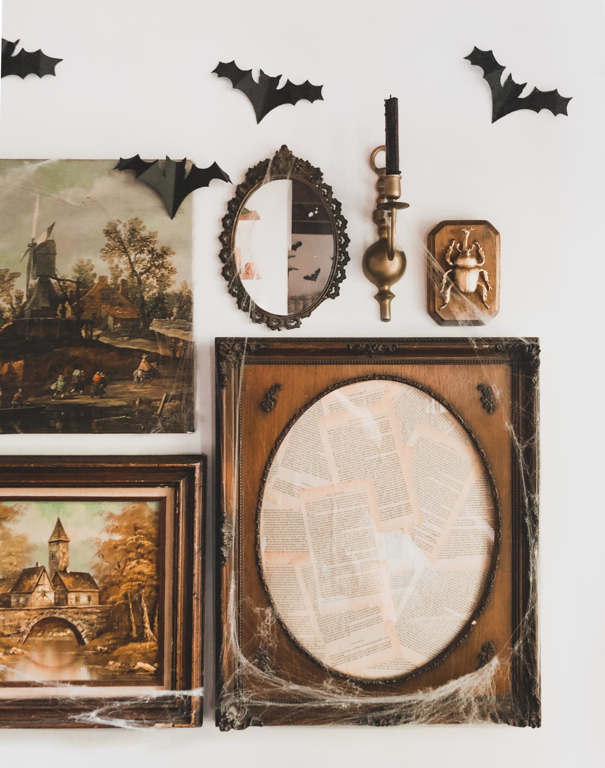 Build a Gothic Gallery Wall With Faux Cobwebs and Dark Frames